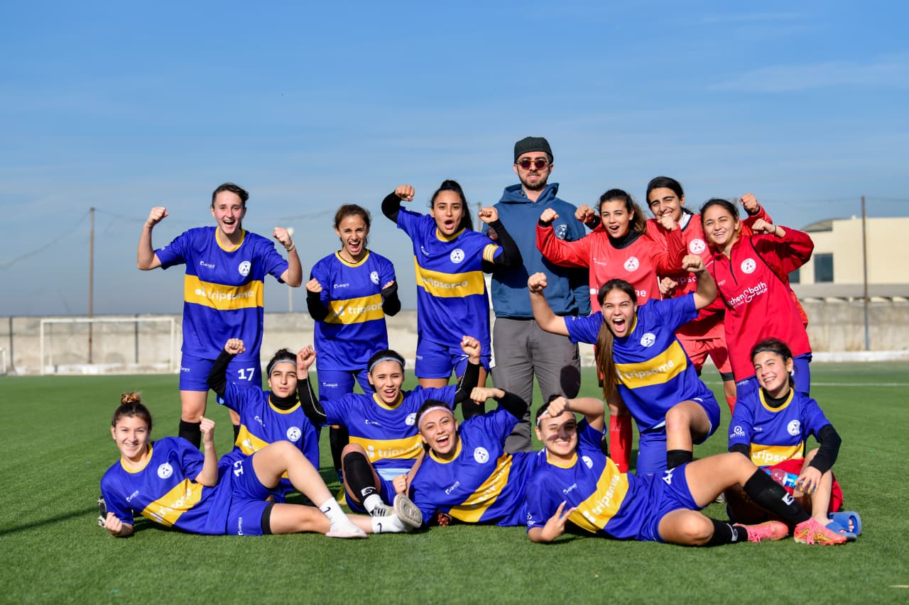 Baku Juniors team celebrating together on the field