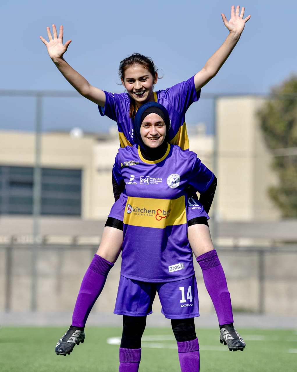 Teammates celebrating joyfully together